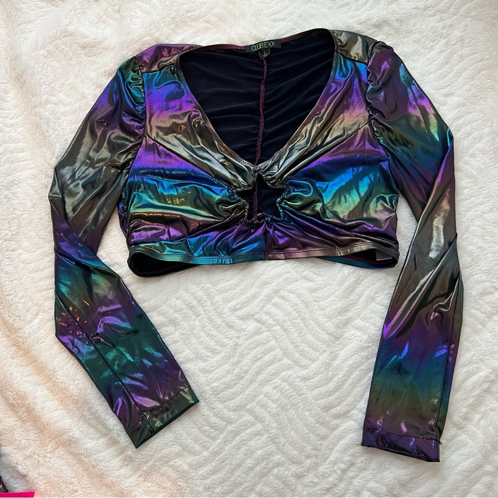 Club exx shimmery iridescent top with star cut out.
